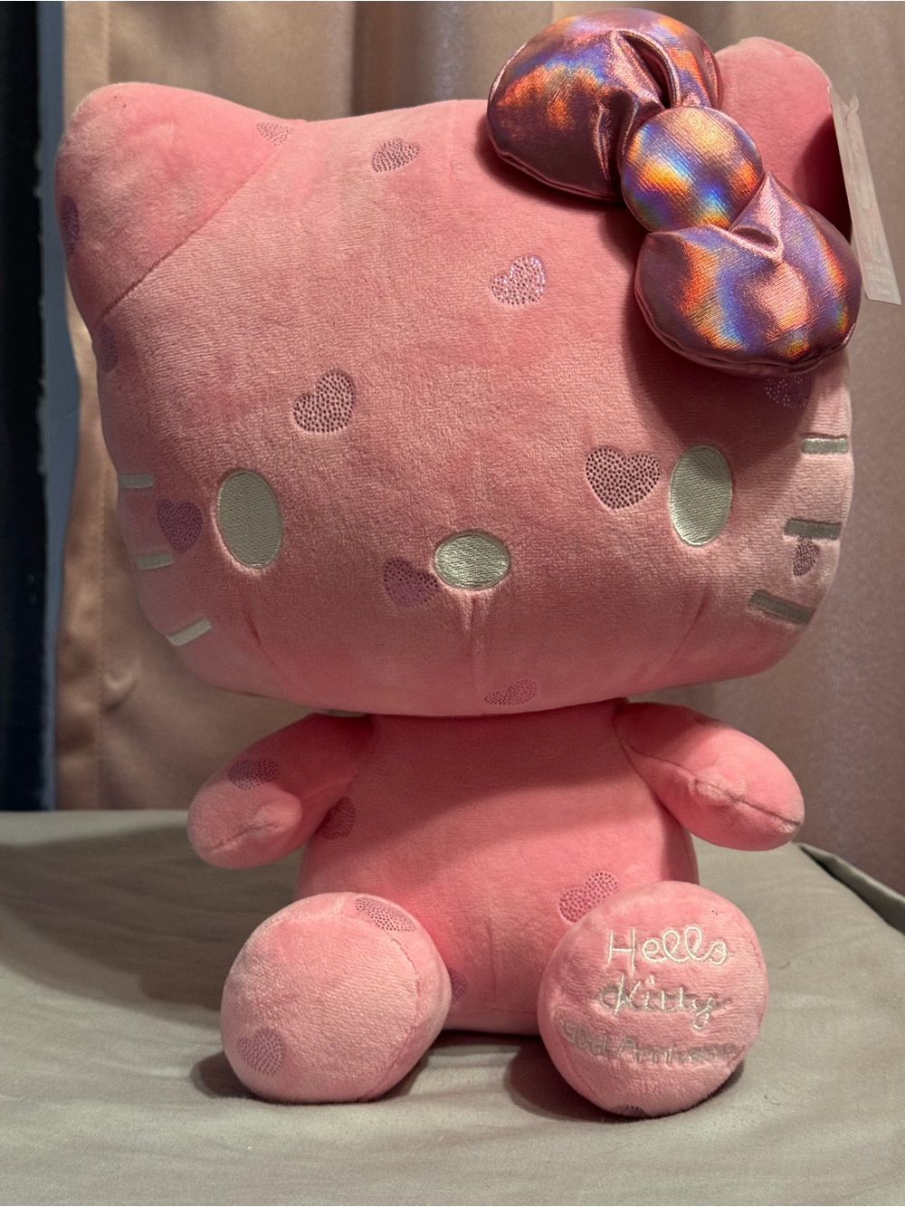 Sanrio Hello Kitty Pink Plush with Iridescent Bow Accent